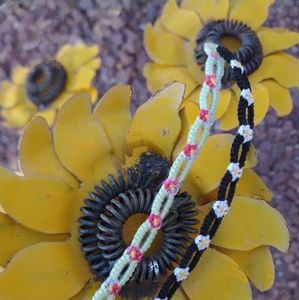 Pair of daisy chain friendship bracelets